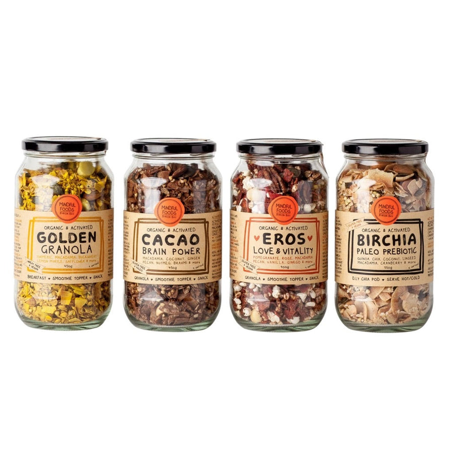 Full range of Mindful Foods granolas in glass jars including organic & activated golden granola, cacao brain power granola, Eros Love & Vitality granola & Birchia paleo Prebiotic granolas