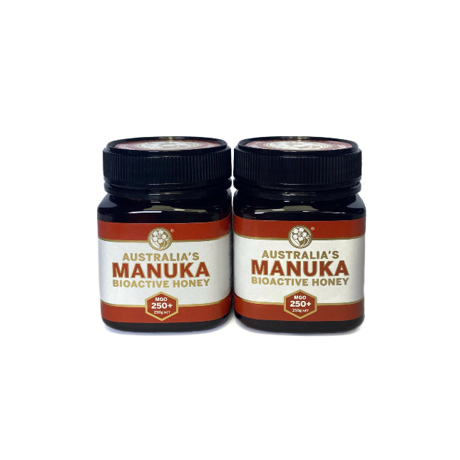 A pair of 250g jars of Australia's Manuka honey with bioactivity of MGO250+ with maroon, white and gold label