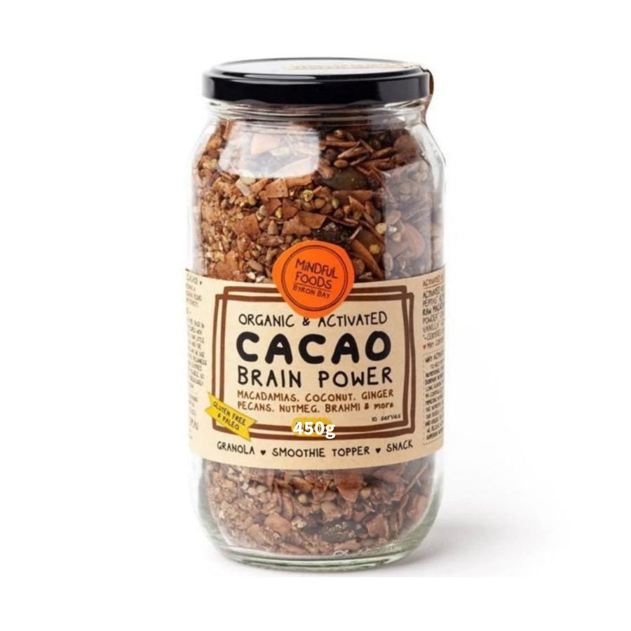 450g Glass jar with showing cacao brain power granola contents and label describing ingredients of macadamias, coconut, ginger, pecans, nutmeg, brahmi and more. Also gluten free & paleo suited as a granola, for smoothies, topper or snack. Made by Mindful Foods