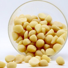 macadamia nuts shelled in glass container